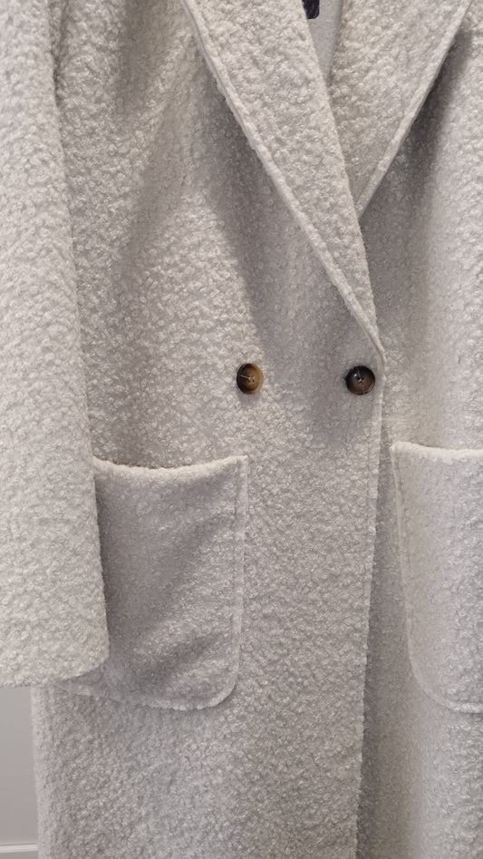 Mantel mit Muster auf der Rückseite